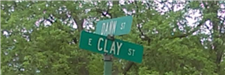 Dann Street and Clay Street Sign